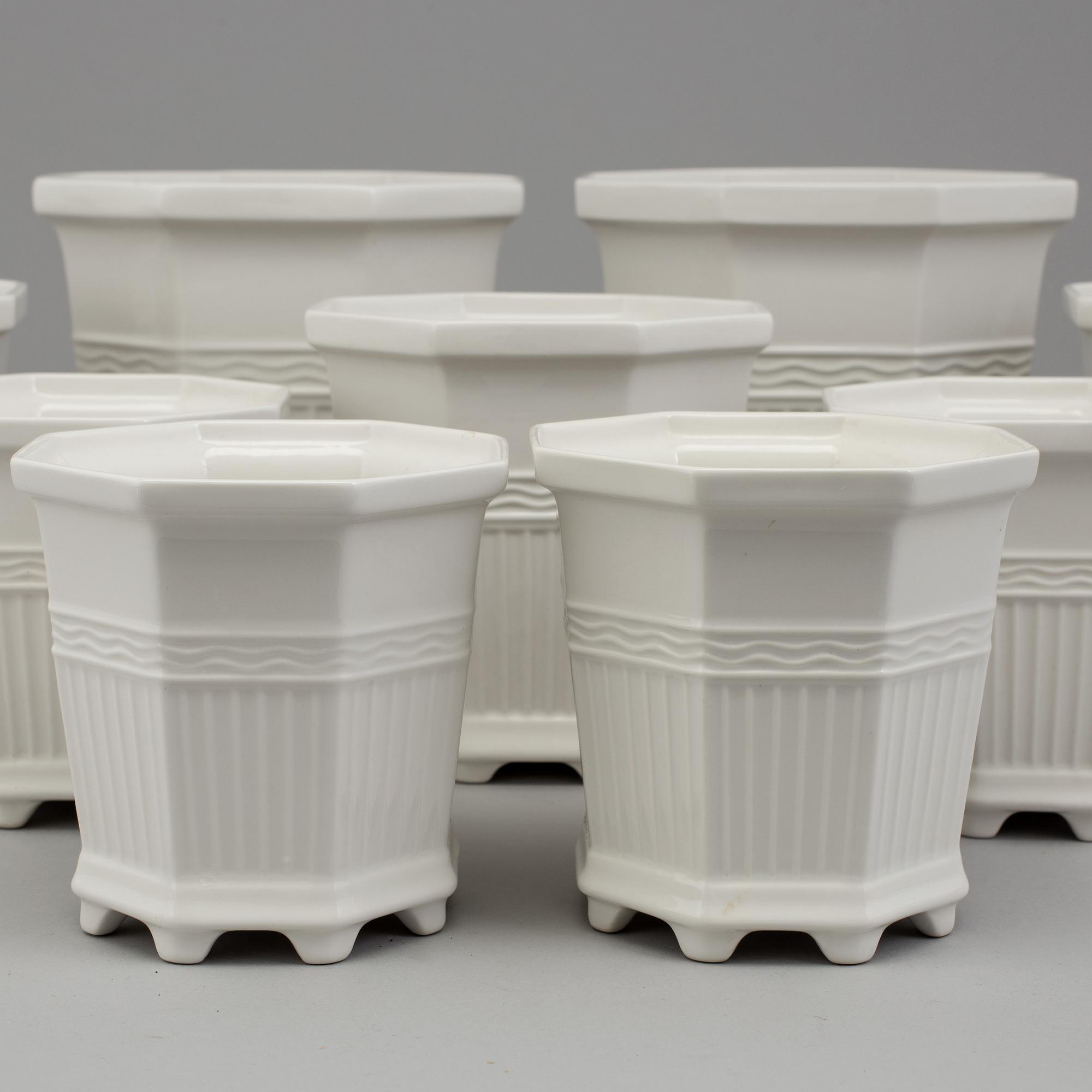 Eleven Swedish porcelain plant pots, Prins Eugen, 'Waldemarsudde', Rörstrand.