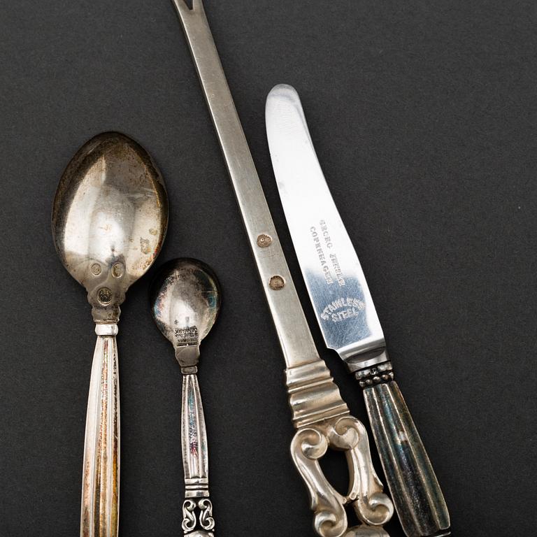 JOHAN ROHDE, 13 pieces of 'Konge/Acorn' silver cutlery from Georg Jensen, Denmark.