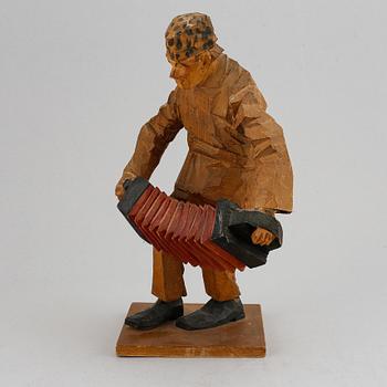 Axel Petersson Döderhultarn, träskulptur. Signerad. Höjd 27 cm.