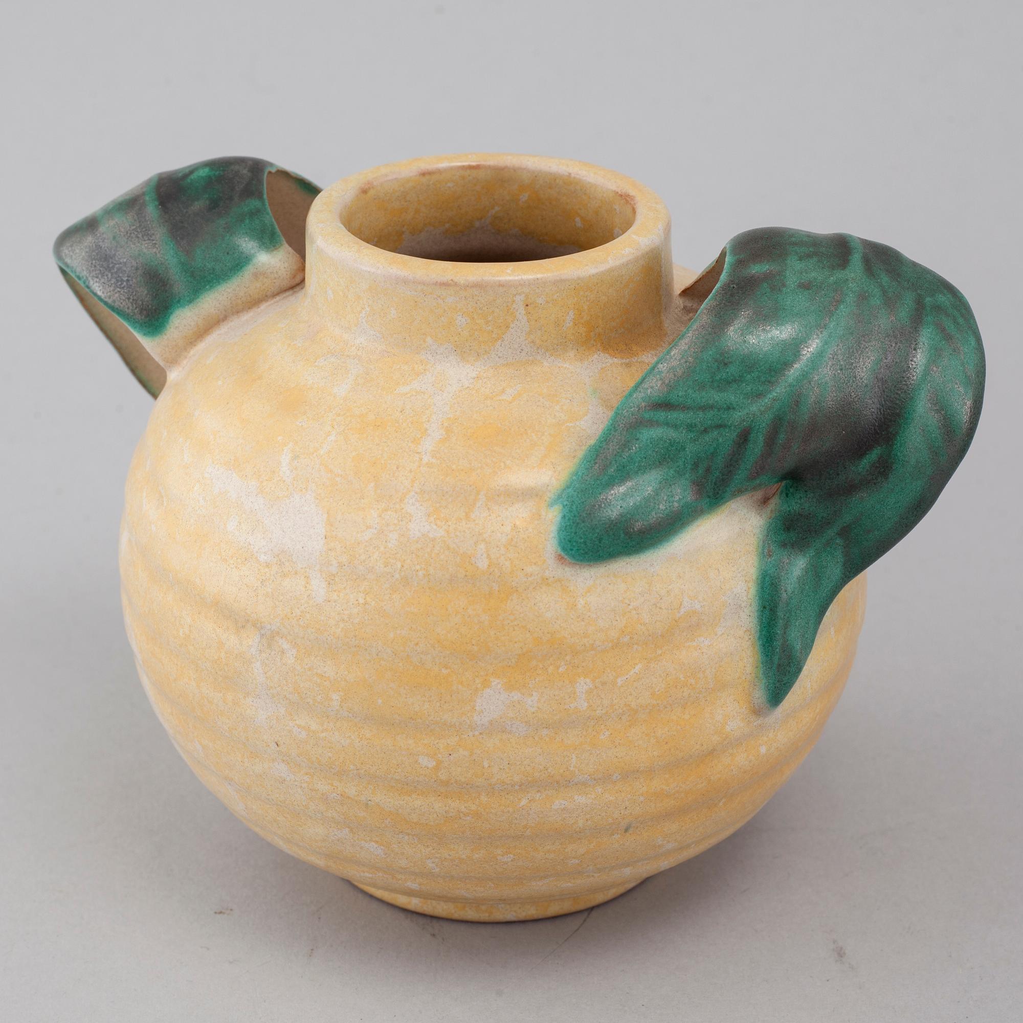 Three vases and on Upsala Ekeby, mid 20th century.