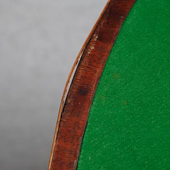 A pair of George III demi-lune mahogany card tables, first half of the 19th Century.