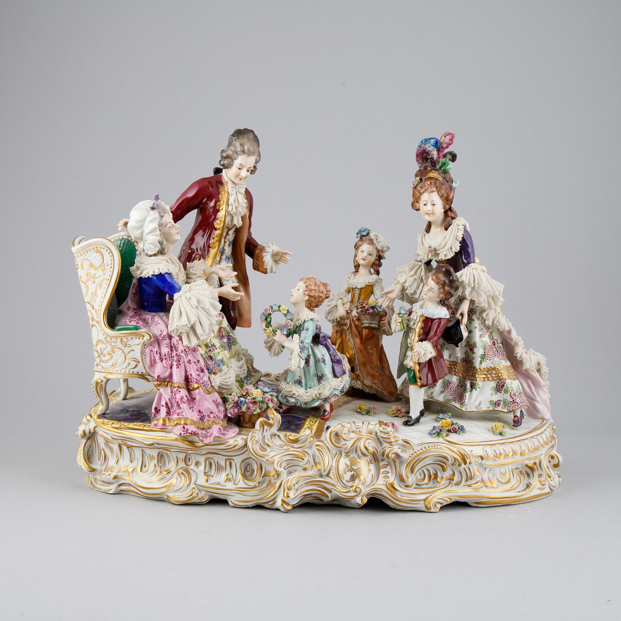 A Rococo style porcelain figurine group, Rudolstadt Volkstedt, Germany, early 20th Century.