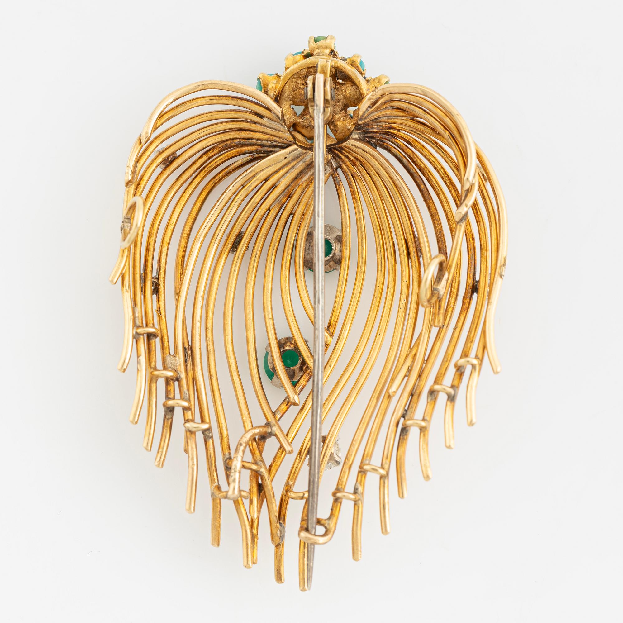 An 18K gold brooch set with turquoises, old-cut diamonds and green quartz.