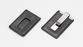 PLÅNBÖCKER 4 st OCH SEDELKLÄMMA MED FODRAL 2 st, Gucci, i originalaskar, 1900/2000.