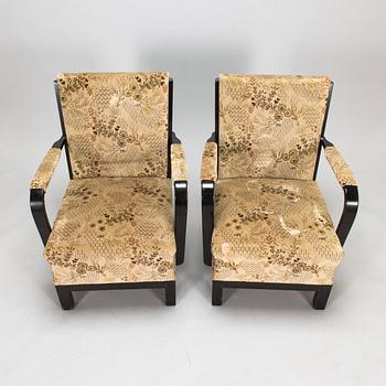 A pair of 1930s 'Panu' armchairs model 234, Asko Finland.