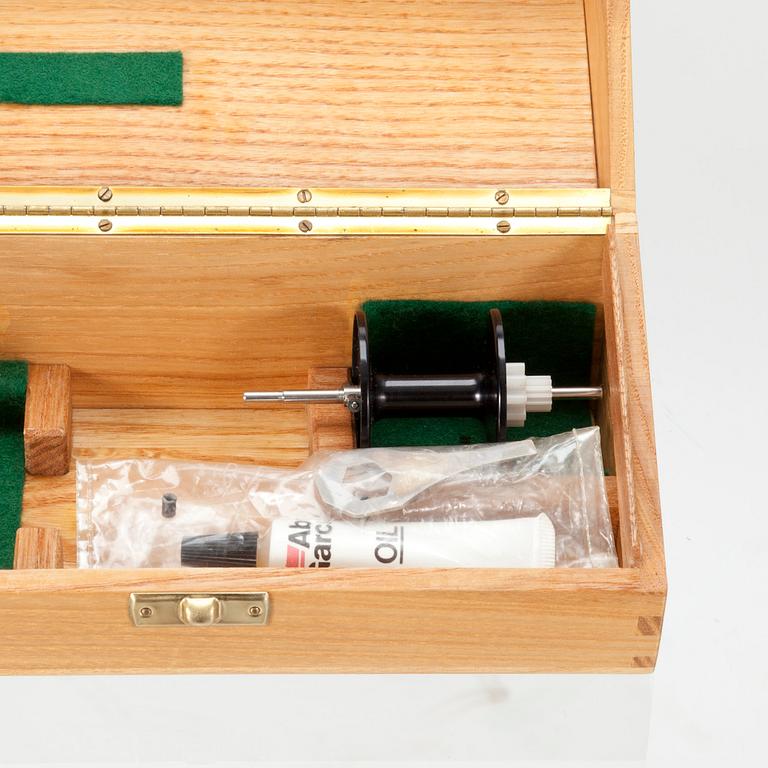 FISKERULLE, förgylld, ABU, Ambassadeur 5000 C De Luxe. 1900-talets slut.