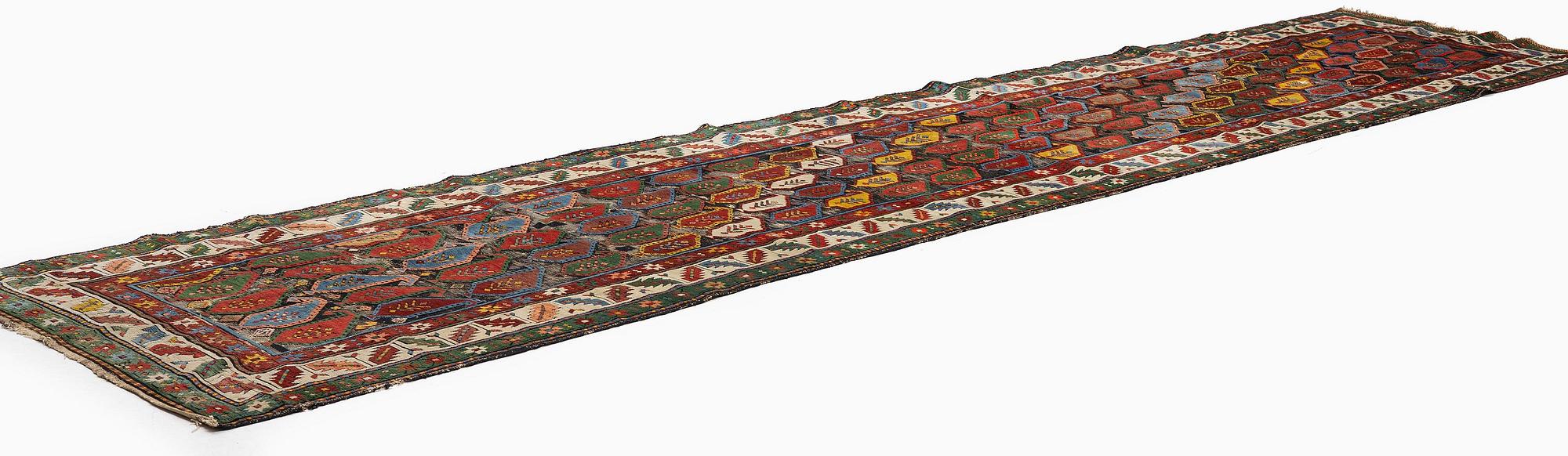 A Kazak runner, southern Caucasus, c. 530 x 110 cm.