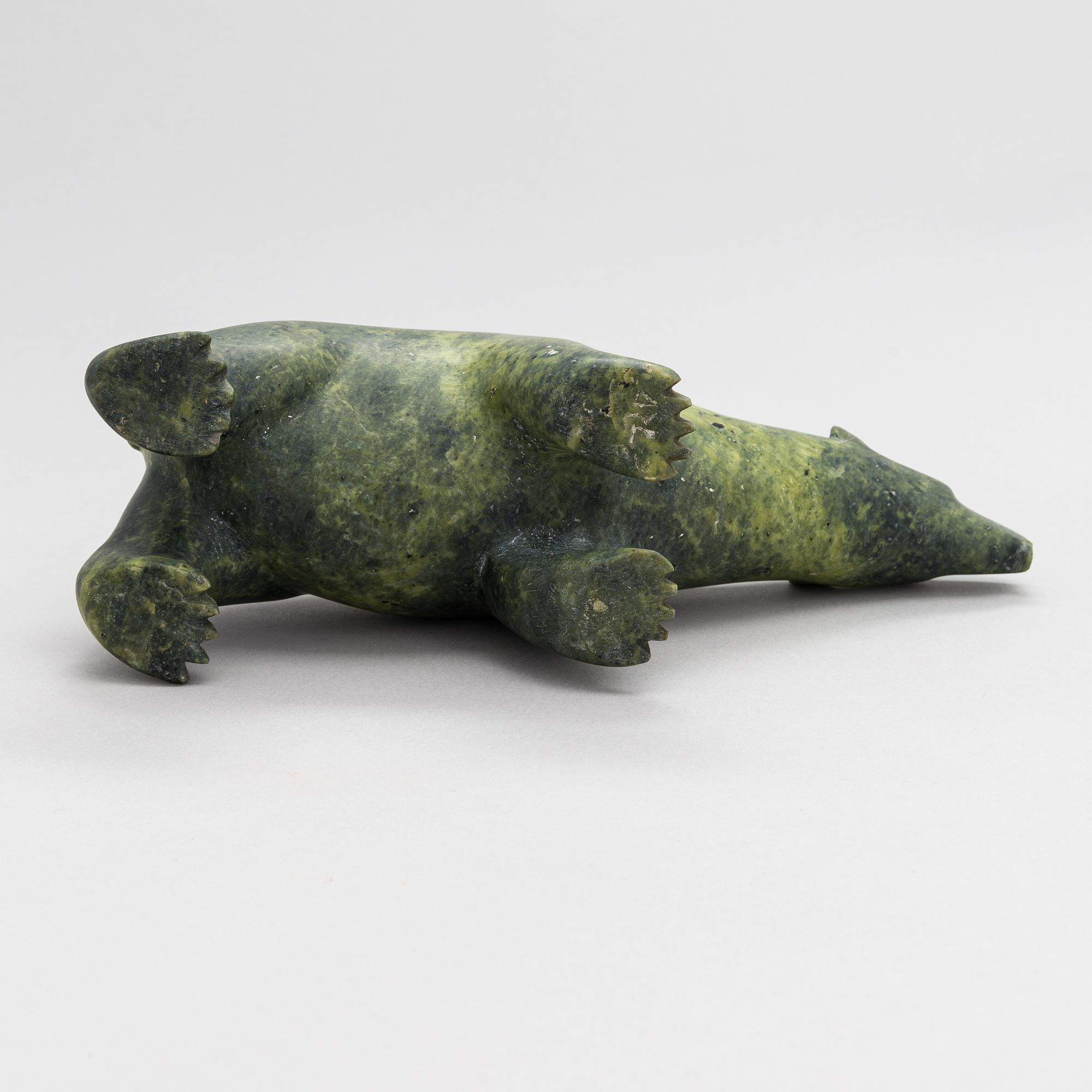 Unknown artist, an inuit soapstone sculpture, signed, 20th century.
