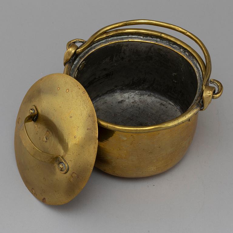 A 19th century brass saucepan.