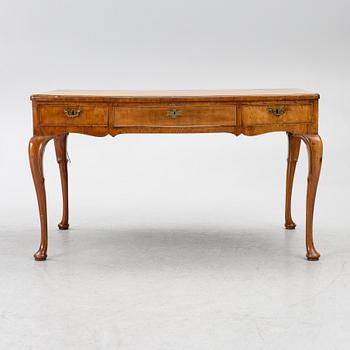 A George II walnut partner's desk, mid 18th century.