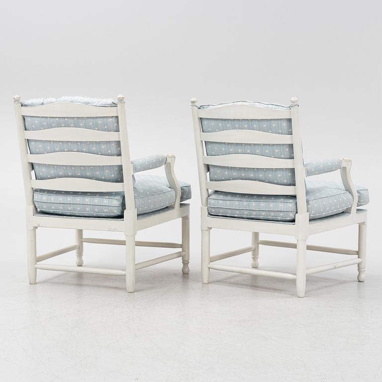 A pair of Gustavian style 'GRipsholmsfåtöljer' armchairs, late 20th century.
