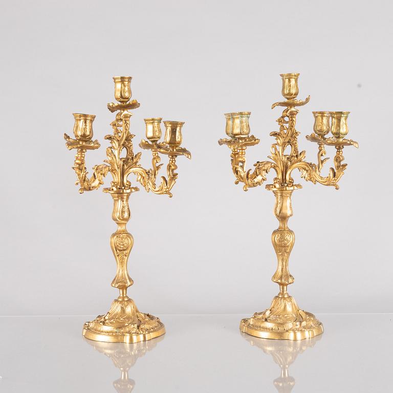 A pair of rococo style candelabras, around 1900.