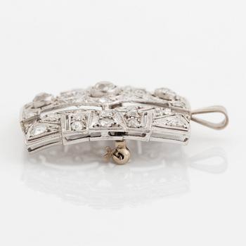 A brooch/pendant in 18K white gold set with old-cut diamonds.