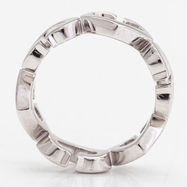 Cartier, an 18K white gold ring, 'C de Cartier', with diamonds totaling approx. 0.10 ct.