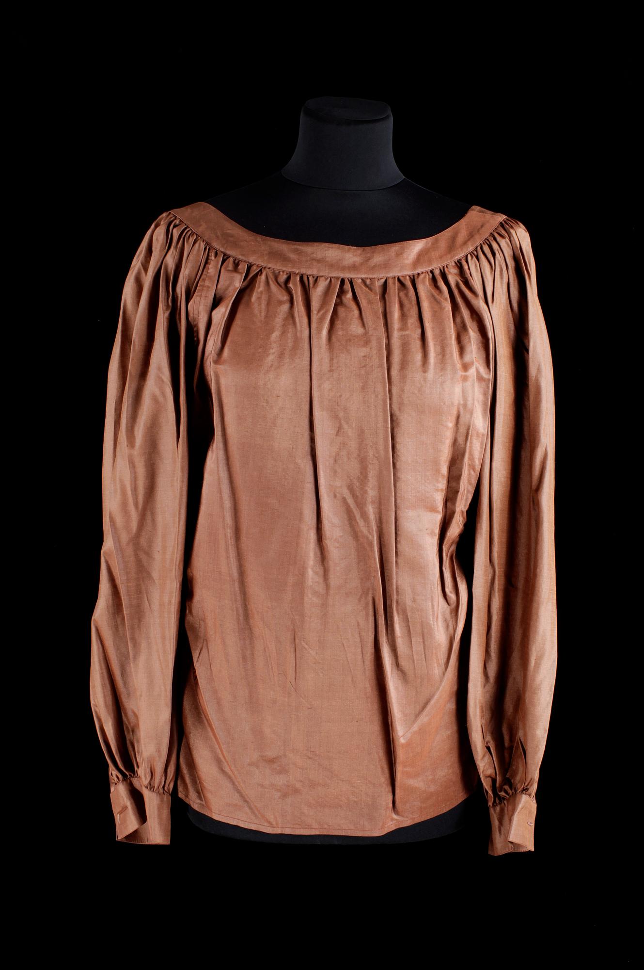 A set of two blouses by Yves Saint Laurent.