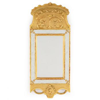 An empire style mirror, 20th century.