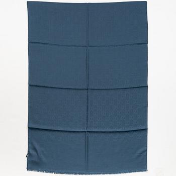 Gucci, a wool and silk mix "GG" jaquard shawl.