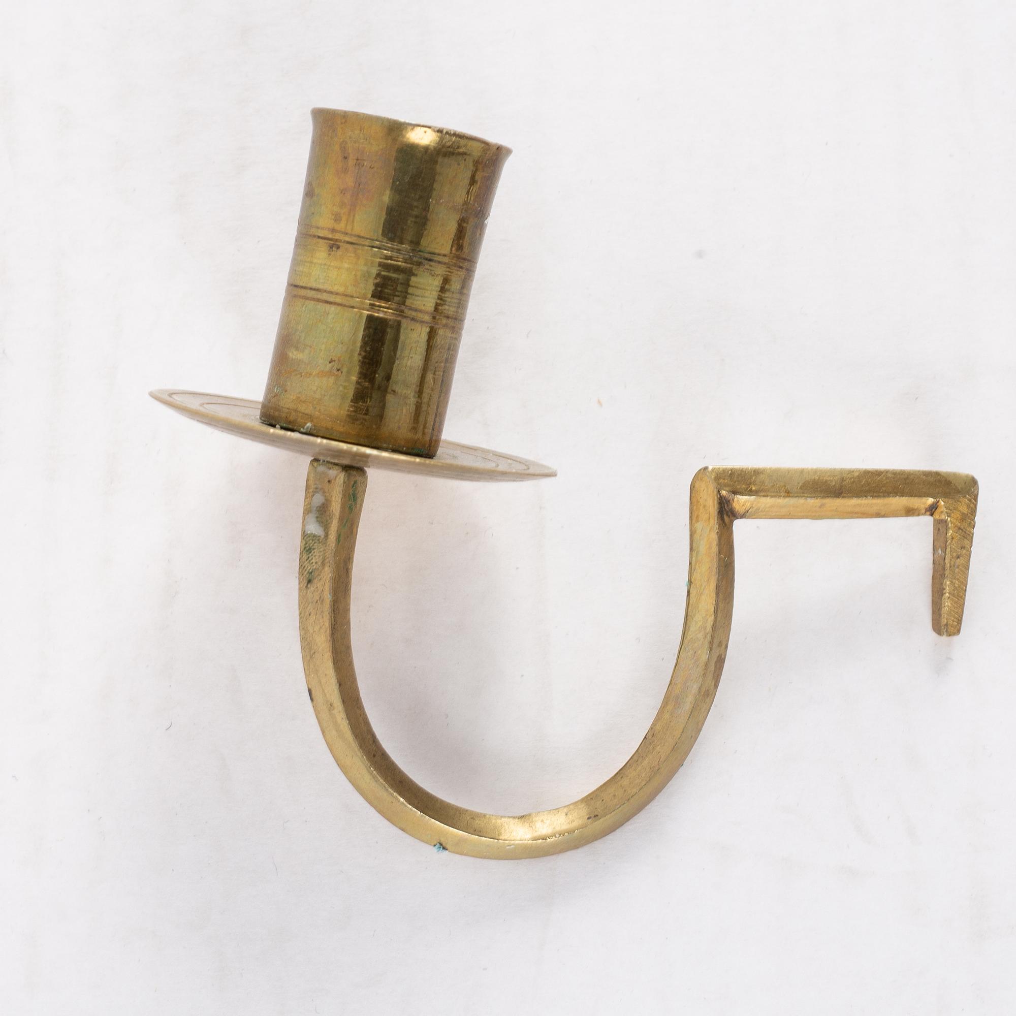 A pair of Swedish Empire mirror wall sconces, first half of the 19th century.