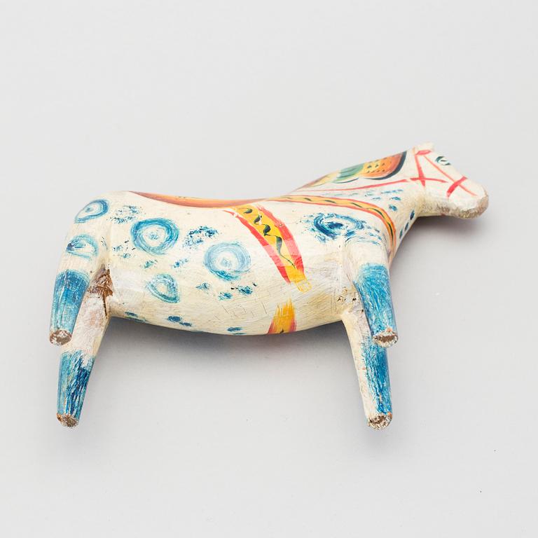 A painted folk art dala horse first half of the 20th century.