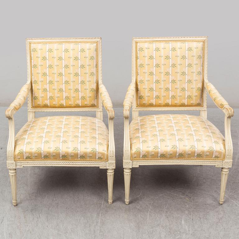 A pair of late 18th century Louis XVI armchairs.