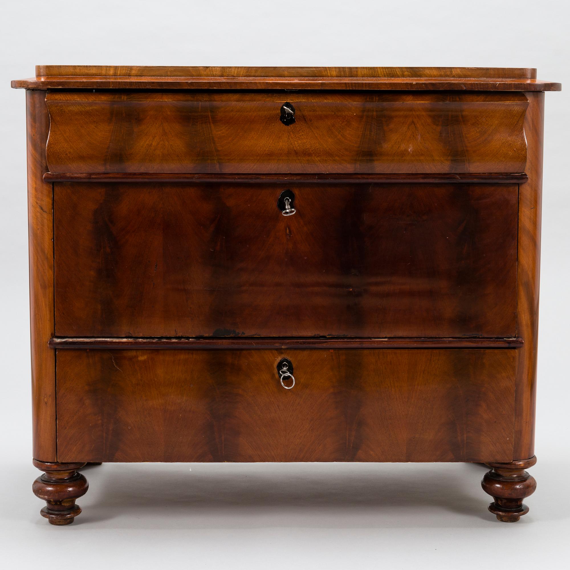A Russian latter half of the 19th century chest of drawers in mahogany.