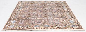 A Moud carpet, part silk, approx. 285 x 195 cm.