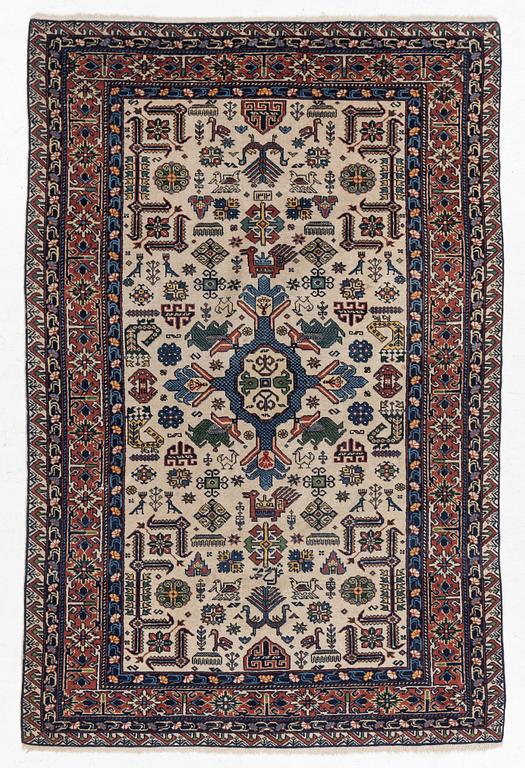 A figural oriental carpet, c. 205 x 134 cm.