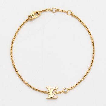 Louis Vuitton, an 18K gold 'Idylle Blossom LV' bracelet with a diamond.