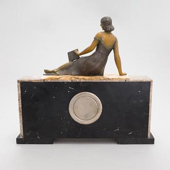 A signed S. Milan, French Art Deco 3 piece mantle clock by Marti dating to the 1920'/30s.