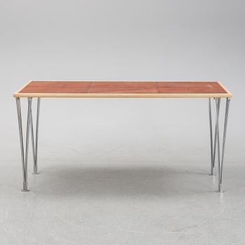 A birch and leather dining table produced by Mathsson International, 21th century.