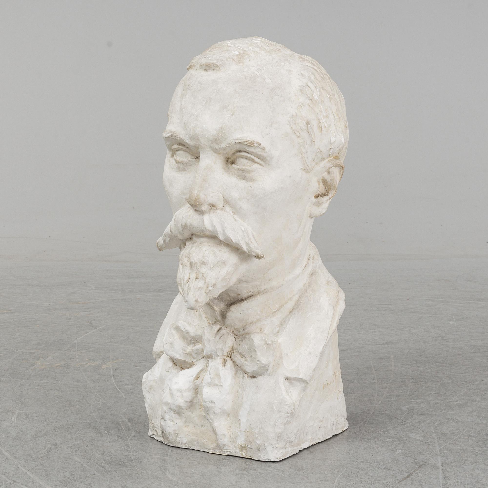 KNUT JERN, a signed plaster sculpture.