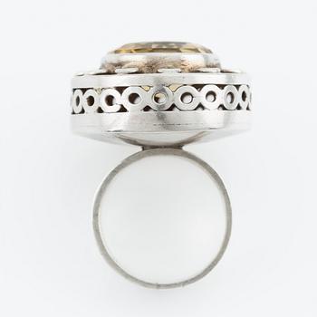 Silver ring with gold stone, signed Ulla Holm.