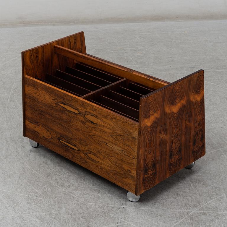 ROLF HESLAND, a rosewood veneered newspaper/LP stand from Bruksbo, Norway.