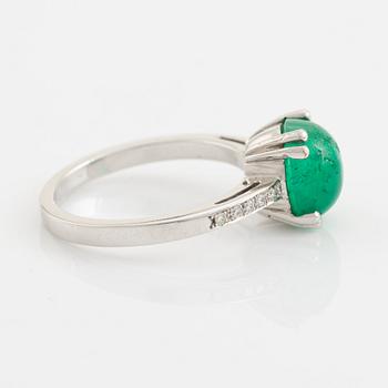 Cabochon emerald and brilliant cut diamond ring.
