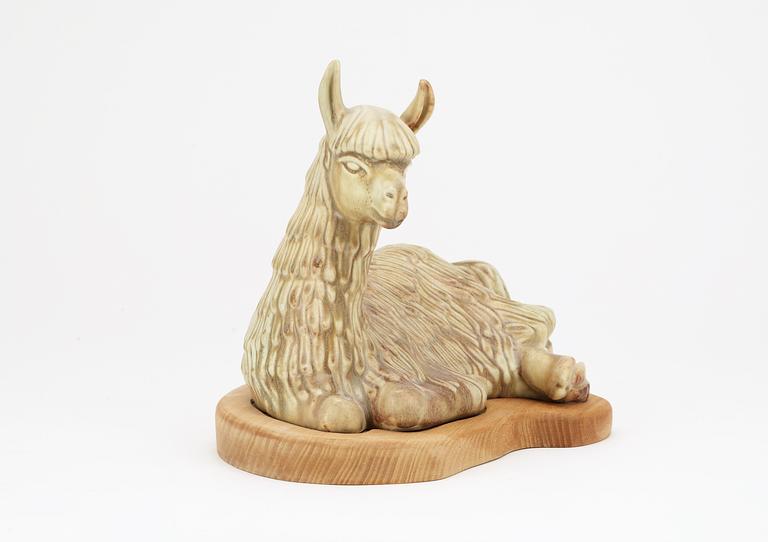 A Gunnar Nylund stoneware figure of a llama, Rörstrand.