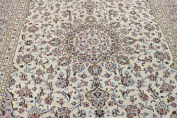 A Kashan carpet, c. 334 x 234 cm.