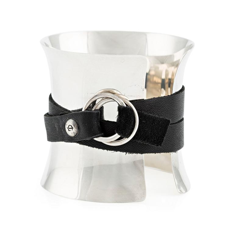 Georg Jensen, a bangle, sterling silver with leather strap, Denmark.