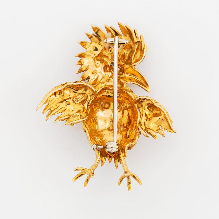 Brosch 18K guld och emalj med åttkantslipade diamanter.