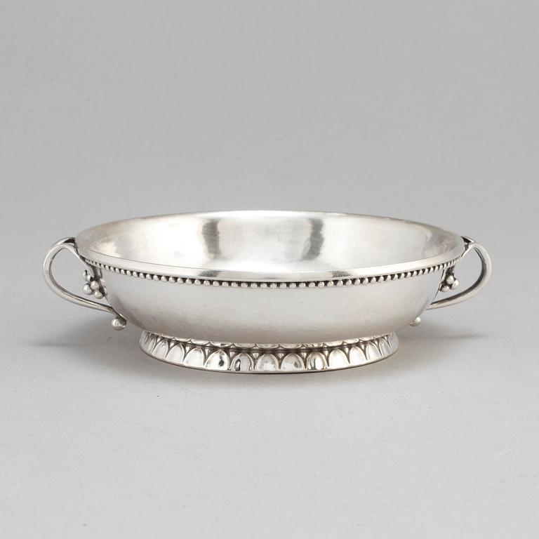 GEORG JENSEN,  a 830/1000 silver mug and  a bowl (a christening set), Copenhagen ca 1918-1927, design nr 127, 158.