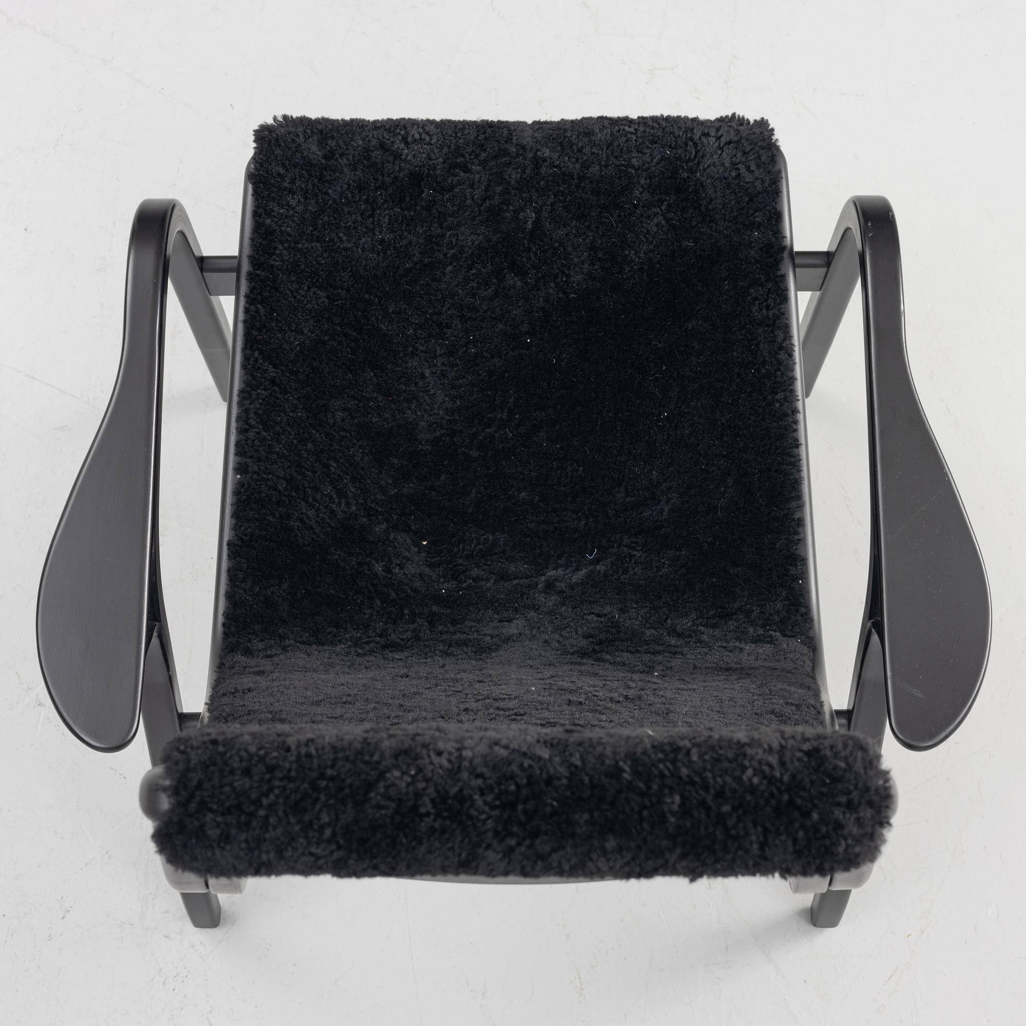 Yngve Ekström, a 'Lamino' easy chair with footstool, Swedese, 2018.