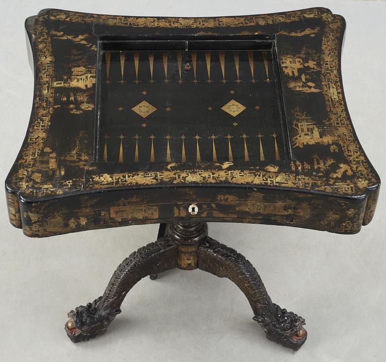A lacquer games table. Qing dynasty, 19th Century.