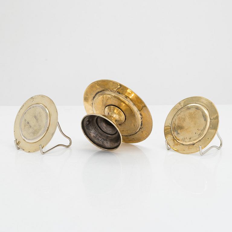 Three 19th-century gilt silver paten, two by master Dmitry Maksimovich Shelaputin, Moscow, 1876-77.