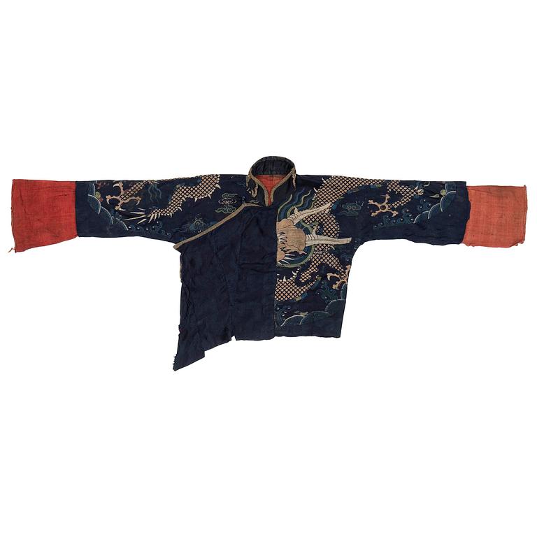 A rare fragment of a silk four clawed 'dragon' jacket, late Ming dynasty/early Qing dynasty.