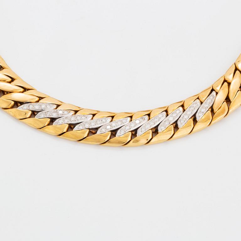 A Bucherer necklace in 18K gold set with round brilliant-cut diamonds.