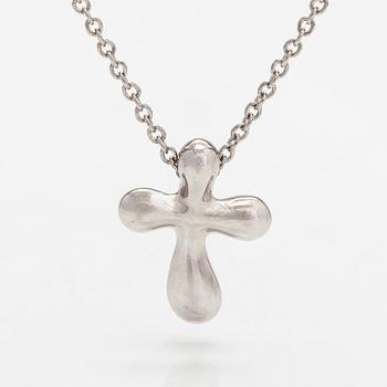 Tiffany & Co, Elsa Peretti, a platinum cross pendant necklace.