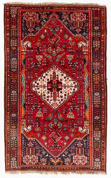 An oriental rug, c. 218 x 133 cm.