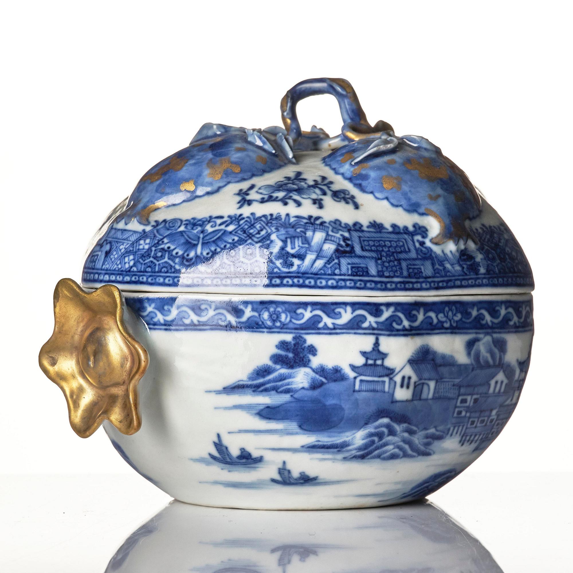 A Chinese blue and white 'pomegranate' tureen with cover and stand, Qing dynasty, Qianlong (1736-95).
