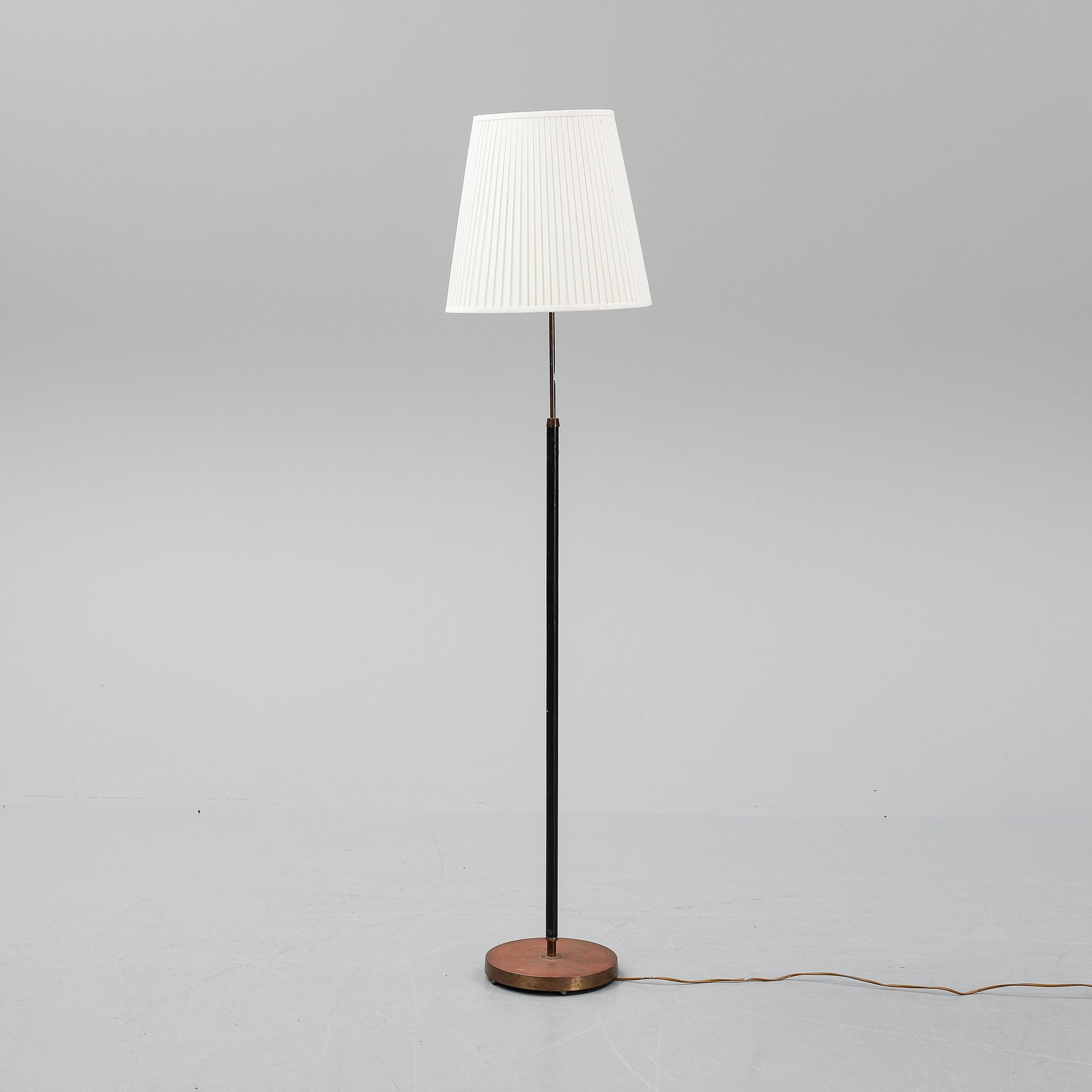 A '7071' floor lamp by Falkenbergs belysning.