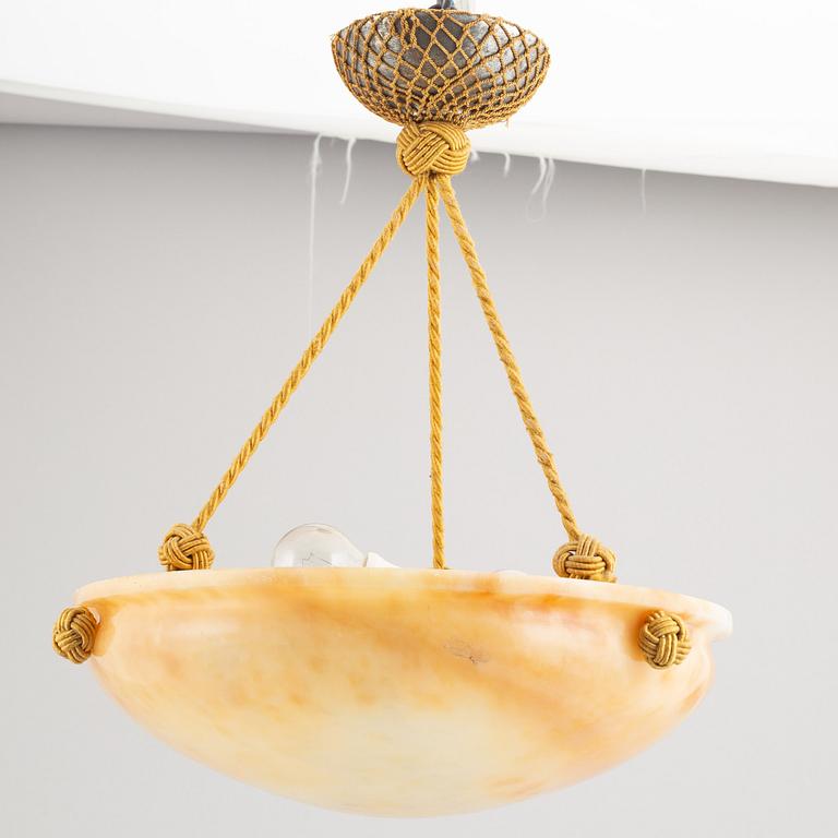 A 1910's/20's alabaster ceiling lamp.