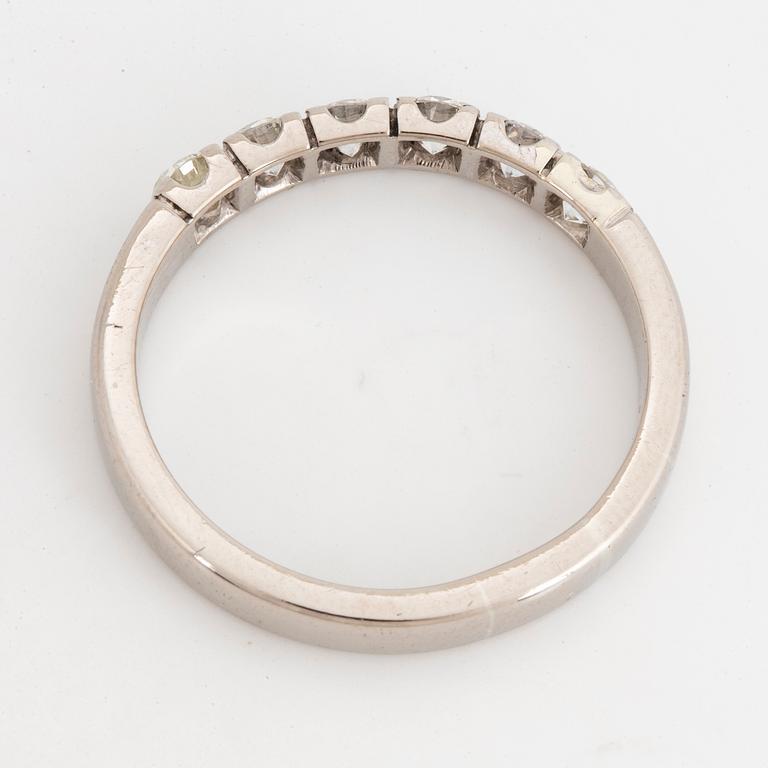 Half eternity brilliant-cut diamond ring.